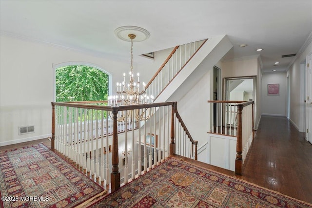2 Warrenton Ln, Colts Neck, NJ 07722 - corridor with a chandelier, ornamental molding, baseboards, an upstairs landing, and wood finished floors