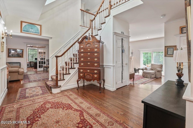 2 Warrenton Ln, Colts Neck, NJ 07722 - entrance foyer featuring wood finished floors, stairway, and crown molding