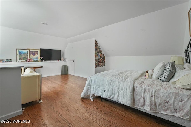 2 Warrenton Ln, Colts Neck, NJ 07722 - bedroom with lofted ceiling, wood finished floors, and baseboards