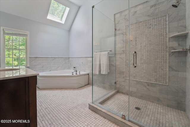 2 Warrenton Ln, Colts Neck, NJ 07722 - full bathroom with a skylight, a bath, a stall shower, tile walls, and vanity