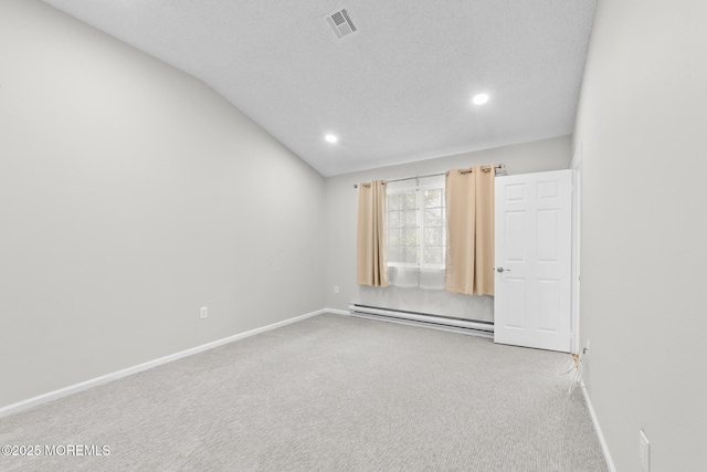 642B Madison Dr Unit 642B, Monroe, NJ 08831 - carpeted empty room with baseboard heating, baseboards, recessed lighting, and vaulted ceiling