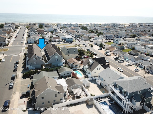 1301 SW Central Ave Unit B8, Seaside Park, NJ 08752 - aerial perspective of suburban area with a large body of water and a pool area