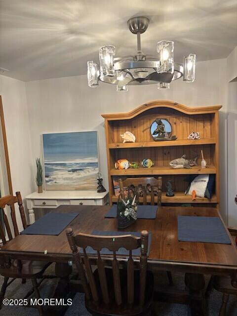 1301 SW Central Ave Unit B8, Seaside Park, NJ 08752 - dining area featuring a chandelier
