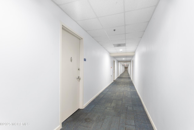 1 Carriage City Plz Unit 711, Rahway, NJ 07065 - corridor featuring dark carpet and a drop ceiling