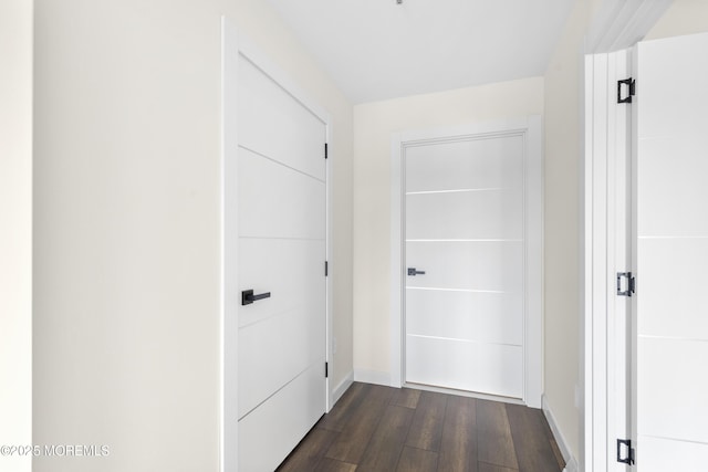 1 Carriage City Plz Unit 711, Rahway, NJ 07065 - hallway featuring dark wood-style flooring and baseboards