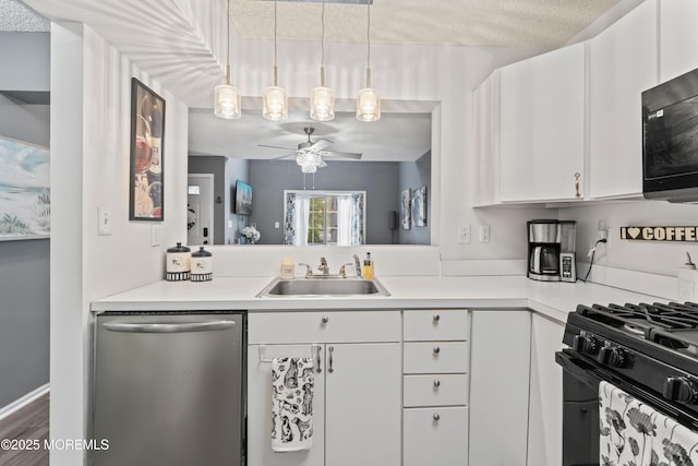 70 Madison Ct, Tinton Falls, NJ 07712 - kitchen featuring black appliances, light countertops, white cabinetry, ceiling fan, and pendant lighting