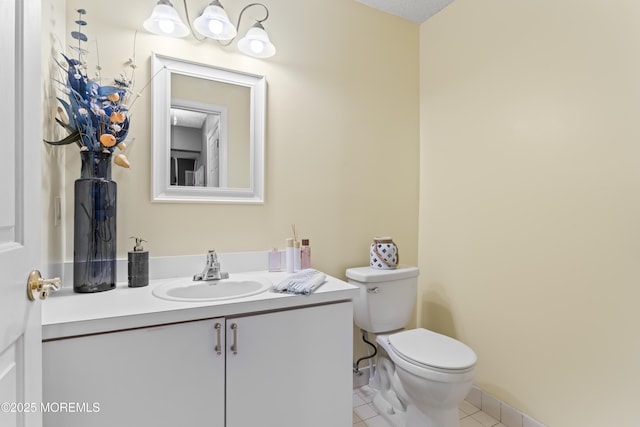 70 Madison Ct, Tinton Falls, NJ 07712 - half bath with vanity and tile patterned floors