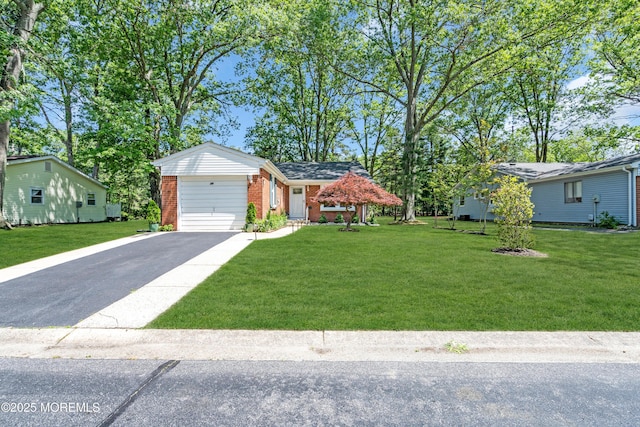29 Bowie Dr, Whiting, NJ 08759 - single story home featuring brick siding, a front yard, driveway, and a garage