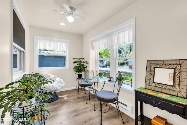 29 Bowie Dr, Whiting, NJ 08759 - dining room with wood finished floors, ceiling fan, and baseboard heating