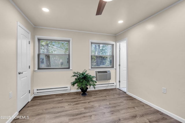 29 Bowie Dr, Whiting, NJ 08759 - spare room with baseboard heating, a wall mounted air conditioner, healthy amount of natural light, ornamental molding, and ceiling fan