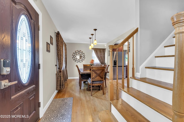 33 Fleetwood Dr, Hazlet, NJ 07730 - entryway with plenty of natural light, light wood-type flooring, stairway, and baseboards