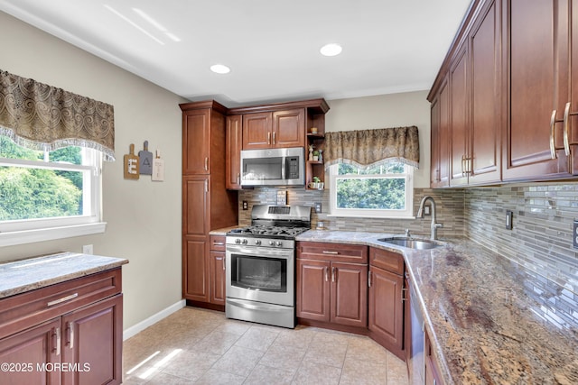 33 Fleetwood Dr, Hazlet, NJ 07730 - kitchen featuring stainless steel appliances, a sink, healthy amount of natural light, tasteful backsplash, and recessed lighting