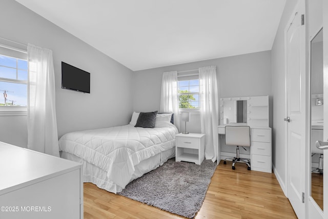 33 Fleetwood Dr, Hazlet, NJ 07730 - bedroom featuring light wood-style flooring and an office area