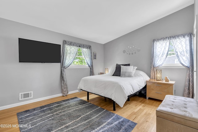 33 Fleetwood Dr, Hazlet, NJ 07730 - bedroom featuring light wood-style flooring, baseboards, and vaulted ceiling