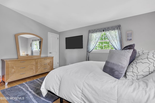33 Fleetwood Dr, Hazlet, NJ 07730 - bedroom with vaulted ceiling and wood finished floors