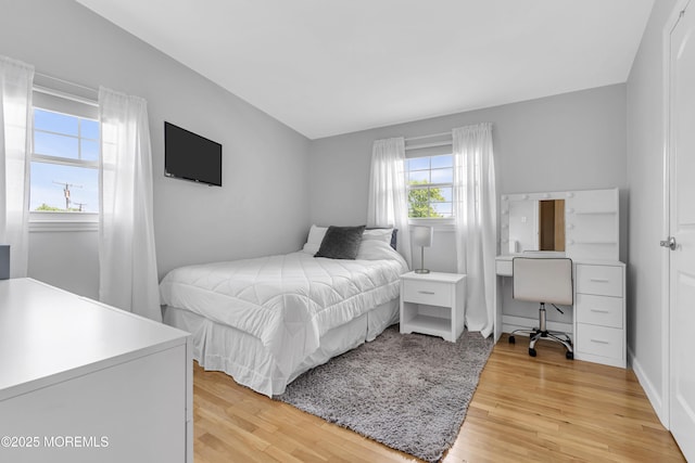 33 Fleetwood Dr, Hazlet, NJ 07730 - bedroom featuring light wood-style flooring and a desk