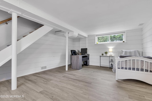 33 Fleetwood Dr, Hazlet, NJ 07730 - bedroom featuring wood finished floors and wood walls