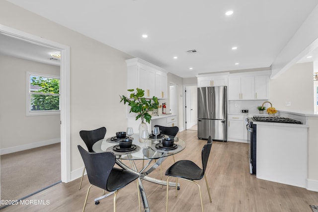 882 Radio Rd, Little Egg Harbor, NJ 08087 - dining area featuring light wood-type flooring, baseboards, and recessed lighting
