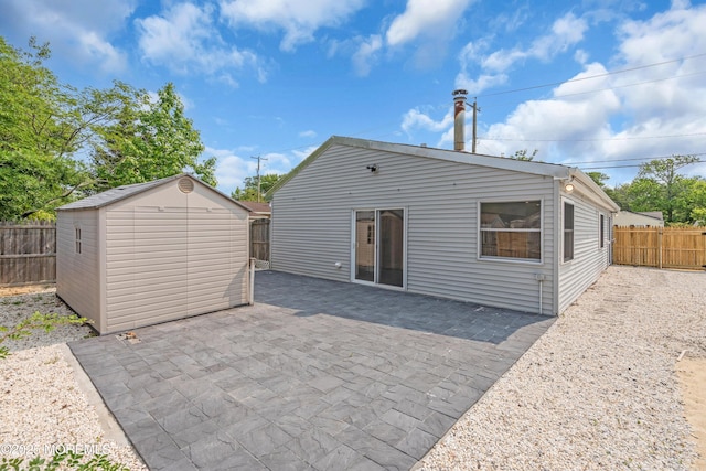 882 Radio Rd, Little Egg Harbor, NJ 08087 - rear view of house with a fenced backyard and a patio