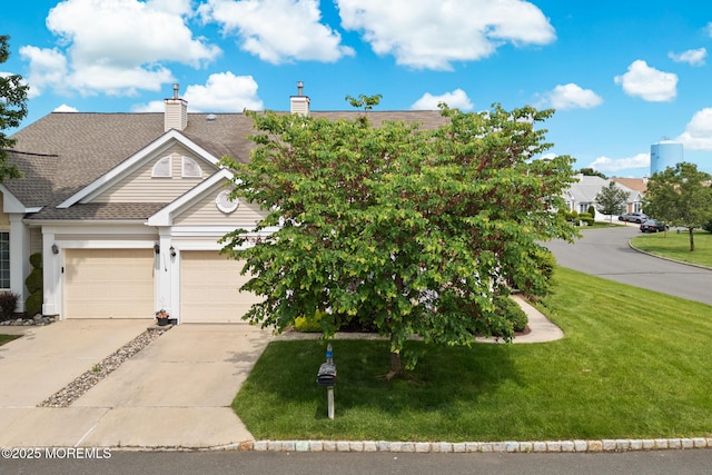 24 Birmingham Ln, Monroe, NJ 08831 - view of front of property featuring a front yard, driveway, a chimney, and roof with shingles