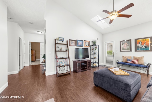 24 Birmingham Ln, Monroe, NJ 08831 - living room featuring wood finished floors, ceiling fan, high vaulted ceiling, a skylight, and baseboards