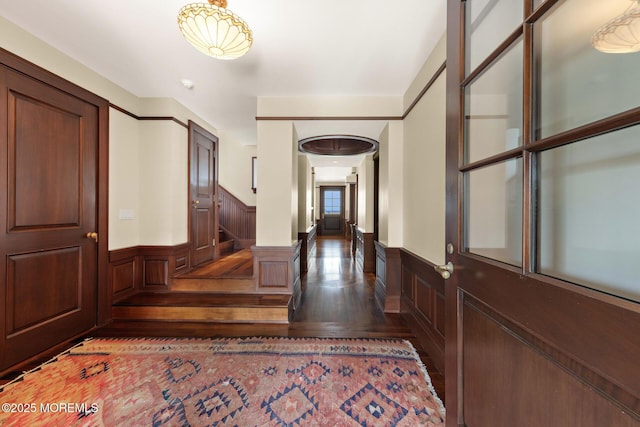 425 E Ave, Bay Head, NJ 08742 - foyer entrance with wainscoting, wood finished floors, and stairway