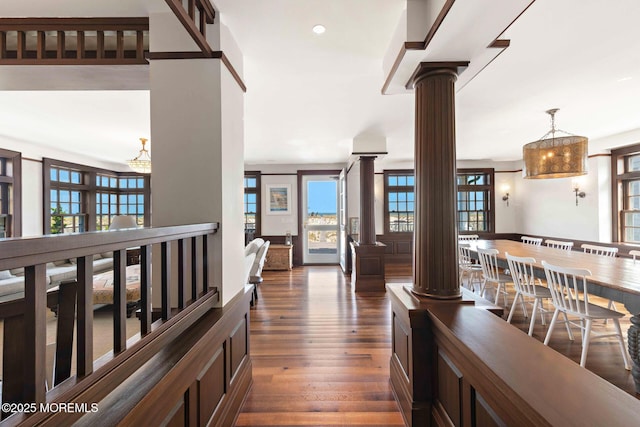 425 E Ave, Bay Head, NJ 08742 - hallway featuring ornate columns, healthy amount of natural light, dark wood-style floors, a chandelier, and recessed lighting