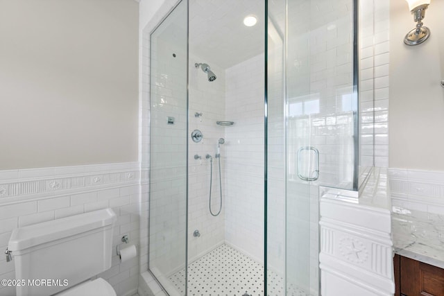 425 E Ave, Bay Head, NJ 08742 - full bathroom featuring a stall shower, wainscoting, tile walls, and vanity