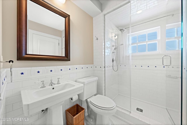 425 E Ave, Bay Head, NJ 08742 - bathroom with tile walls, a shower stall, and a wainscoted wall