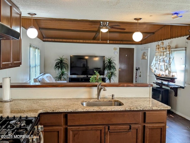 608 Lane G, Holmdel, NJ 07733 - kitchen with decorative light fixtures, dark wood-type flooring, a ceiling fan, light stone counters, and a textured ceiling