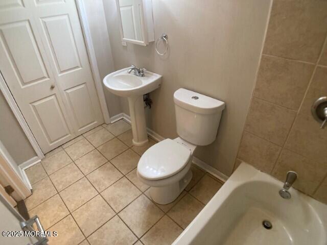 273 Stuart St, Howell, NJ 07731 - full bathroom with tile patterned flooring, a bathtub, and toilet
