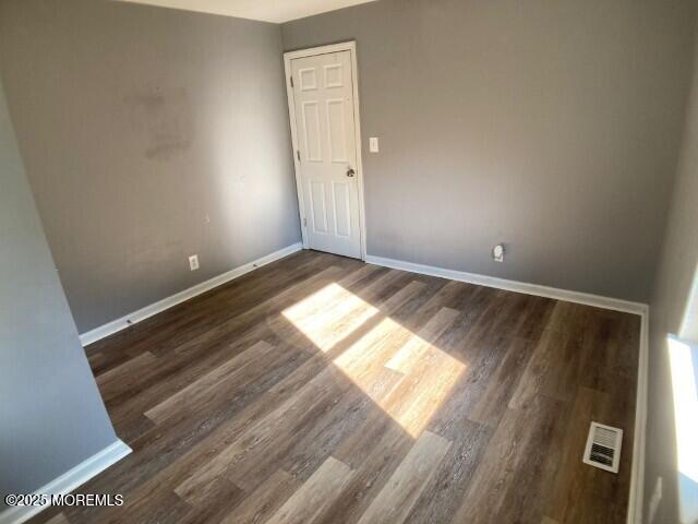 273 Stuart St, Howell, NJ 07731 - spare room with wood finished floors and baseboards