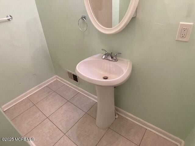 273 Stuart St, Howell, NJ 07731 - bathroom with tile patterned floors and baseboards