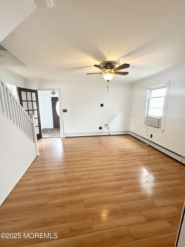 170 Park Ave, Keansburg, NJ 07734 - spare room with stairs, a ceiling fan, light wood-style floors, cooling unit, and baseboards