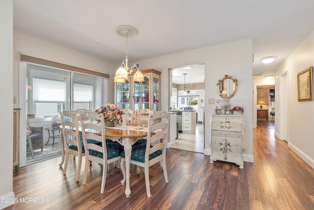 14 Turnbridge Row, Manchester, NJ 08759 - dining room with a chandelier, wood finished floors, and baseboards
