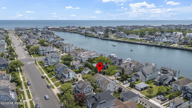 321 Mckinley Pl, Avon-By-The-Sea, NJ 07717 - aerial view of residential area with a nearby body of water