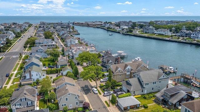 321 Mckinley Pl, Avon-By-The-Sea, NJ 07717 - aerial view of residential area with a large body of water