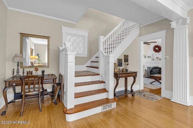 116 Curtis Ave, Manasquan, NJ 08736 - staircase featuring hardwood / wood-style floors, ceiling fan, ornamental molding, and decorative columns