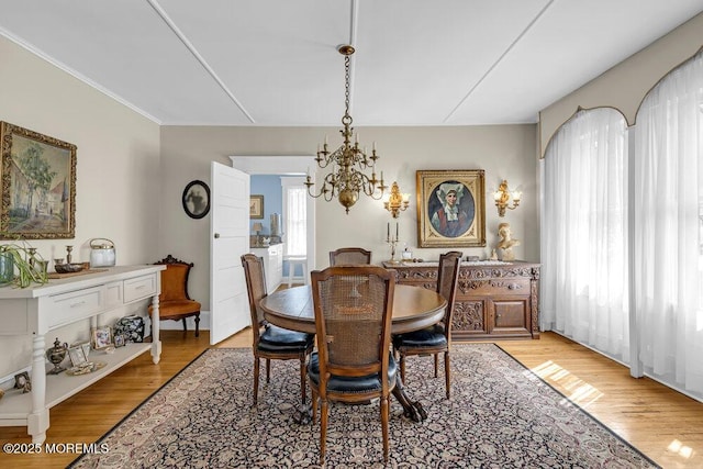 116 Curtis Ave, Manasquan, NJ 08736 - dining room featuring a chandelier and light wood-style flooring