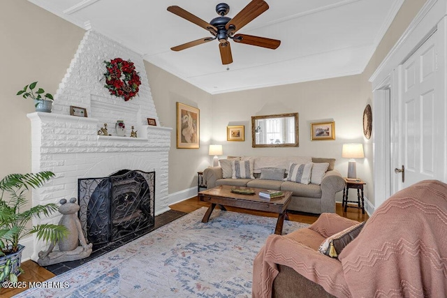116 Curtis Ave, Manasquan, NJ 08736 - living area featuring ceiling fan, baseboards, crown molding, wood finished floors, and a fireplace