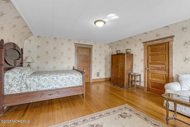 116 Curtis Ave, Manasquan, NJ 08736 - bedroom with wallpapered walls and hardwood / wood-style floors