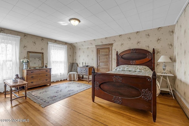 116 Curtis Ave, Manasquan, NJ 08736 - bedroom with wallpapered walls and light wood-style floors
