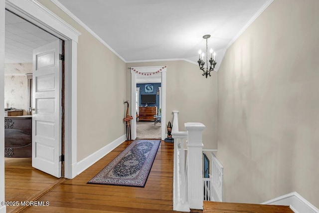 116 Curtis Ave, Manasquan, NJ 08736 - entryway with wood-type flooring, a chandelier, crown molding, and baseboards