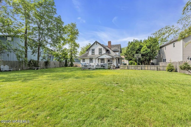 116 Curtis Ave, Manasquan, NJ 08736 - rear view of house with a chimney