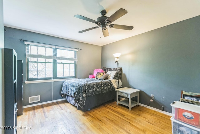 321 Spring St Unit 8, Red Bank, NJ 07701 - bedroom with light wood-style flooring, a ceiling fan, and baseboards