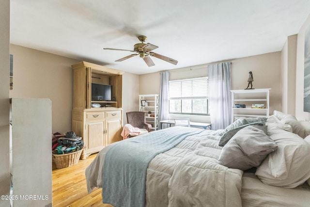 321 Spring St Unit 8, Red Bank, NJ 07701 - bedroom with light wood-style flooring and a ceiling fan