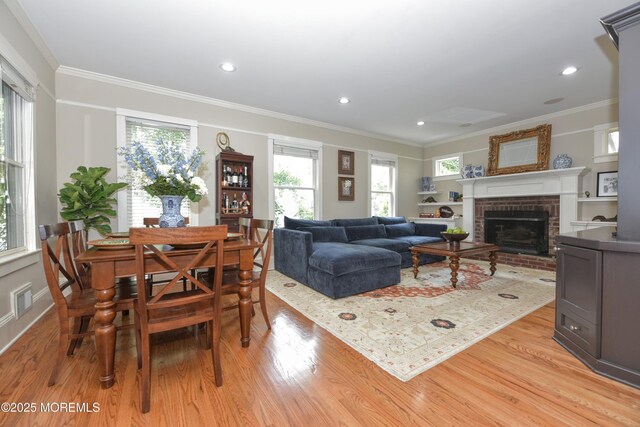 51 Clay St, Fair Haven, NJ 07704 - dining area featuring light wood finished floors, crown molding, a fireplace, and recessed lighting