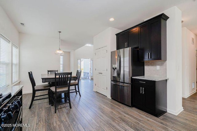 11 Starry Ln, Barnegat, NJ 08005 - kitchen with stainless steel fridge, wood finished floors, healthy amount of natural light, decorative backsplash, and recessed lighting