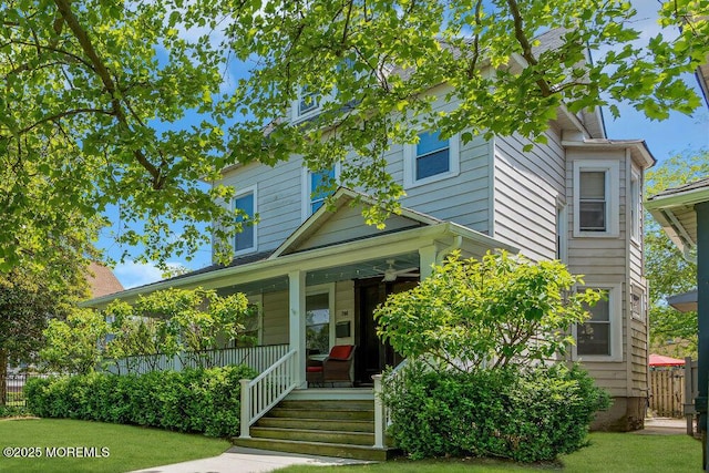 708 7th Ave, Asbury Park, NJ 07712 - traditional style home featuring a porch and a front lawn