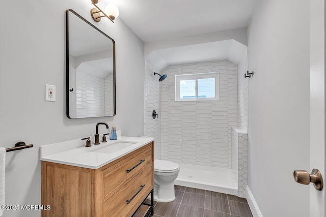 708 7th Ave, Asbury Park, NJ 07712 - full bathroom featuring vanity, toilet, and tiled shower